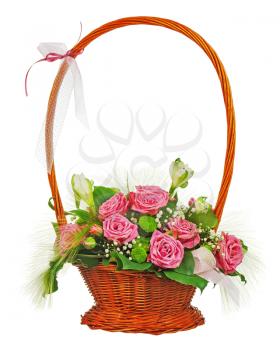Colorful flower bouquet from roses in wicker basket  isolated on white background. Closeup.