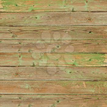 Old greeen wood plank background. Closeup.