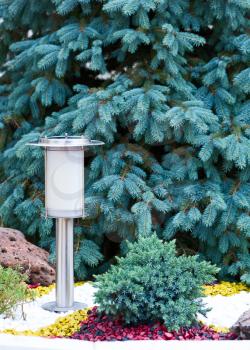 Solar Powered Lamp on Garden Background. Selective Focus.