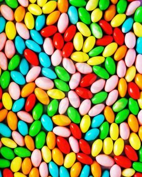Assorted sweet jelly beans. Pile of colorful chocolate coated candy. Colorful image great for backgrounds.