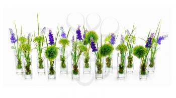 Flower bouquets  from artificial flowers arrangement centerpiece in glass vases on white background.