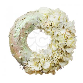 Composition of dried flowers and berries in shape of circle isolated on white.
