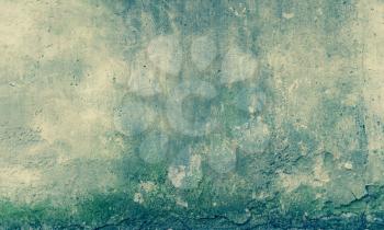Grunge Background. The Old Wall which has been Covered with Concrete with Cracks and Dirt Spots.