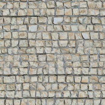 Seamless Texture of Old Wall Lined With Decorative Stone.