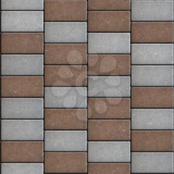 Brown and Grey Rectangular Paving Slabs Laid in Zgzag. Seamless Tileable Texture.