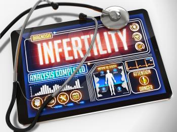 Infertility - Diagnosis on the Display of Medical Tablet and a Black Stethoscope on White Background.