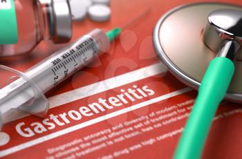 Gastroenteritis - Printed Diagnosis on Orange Background and Medical Composition - Stethoscope, Pills and Syringe. Medical Concept. Blurred Image.