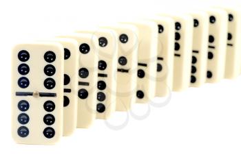 Macro shot of a group of dominoes in a row