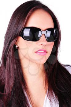Atractive young woman with sun glasses isolated on white