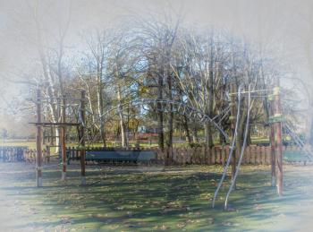 empty childrens playground in autumn park