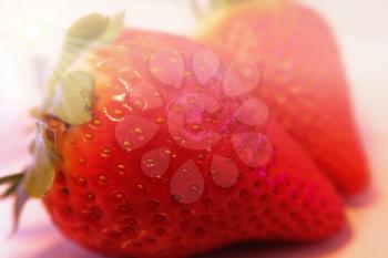 Red Tasty Strawberries on abstract background