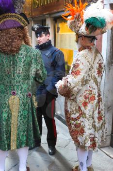 police officer and people in costume, Venice Carnival