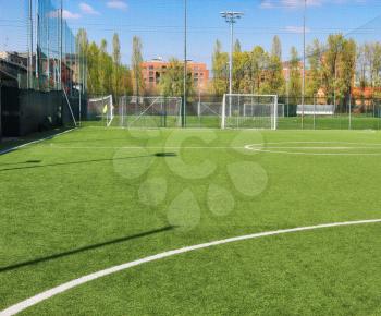 empty mini-football field and blue sky