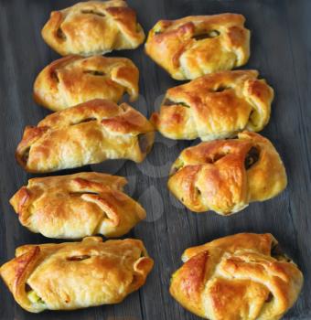 hommade pastry. Mini pies with cheese and egg