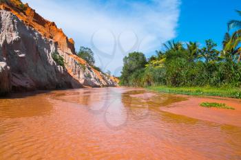 Beautiful Red River and shores of colored sandstone, Vietnam, Southeast Asia