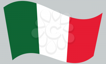 Flag of Italy waving on gray background