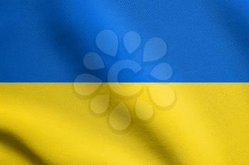 Flag of Ukraine waving in the wind with detailed fabric texture. Ukrainian national flag.