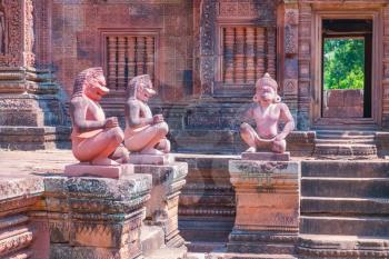 Ancient stone statues in Angkor Wat complex, Siem Reap, Cambodia. UNESCO World Heritage Site.