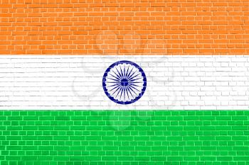 Flag of India on brick wall texture background. Indian national flag.