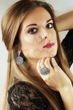 Beautiful woman in an old ethnic silver jewelry