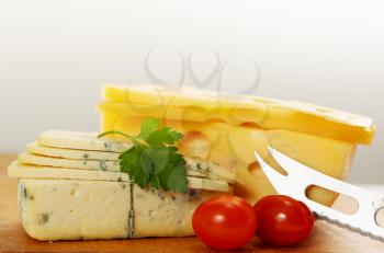 blue cheese and Swiss cheese with cherry tomatoes