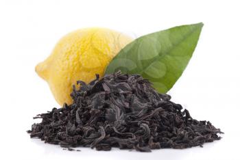 Royalty Free Photo of Black Tea and a Lemon