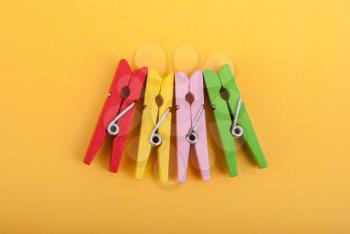 Clothespins of different colors.