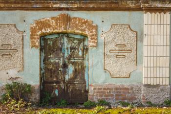 Rusty Locked Door In An Old House