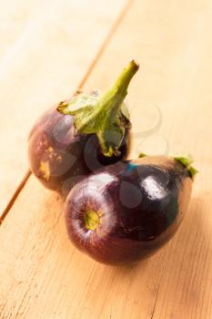 Healthy Organic Vegetables Eggplants On A Wooden Background
