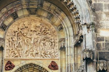 Bas-relief On Famous Landmark - Church Of Our Lady Before Tyn In Prague, Czech Republic. Jesus Christ Crucified On The Cross - Biblical Story.