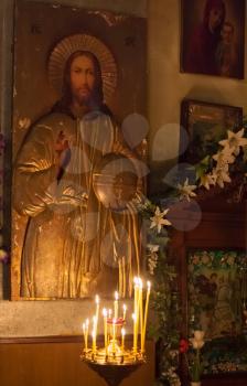 GOMEL - MAY 4: Interior Of Belarusian Orthodox Church. Candles Under The Ancient Icon Framed With The Gold On May 4, 2013 In Gomel, Belarus