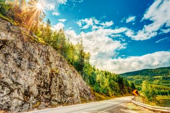Norway, Road In Norwegian Mountains. Summer View. Sunny Day, Landscape With Rocks And Road