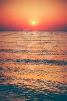 Soft Sea Ocean Waves Wash Over Golden Sand Background. Sunset, Sunrise, Sun.  Toned Instant Photo