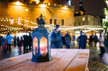 Moroccan Old Vintage Lantern Lamp On Table Outdoor At Night Christmas Xmas City Background. Winter Holiday Evening Or Night