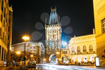 Night View Of The Powder Tower Or Powder Gate. This Landmark Is A Gothic Tower In Prague, Czech Republic. It Is One Of The Original City Gates, Dating Back To The 11th Century.