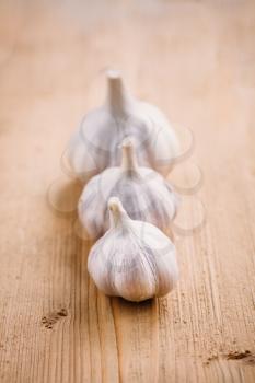 Healthy Organic  Whole Garlic Vegetables On The Wooden Background