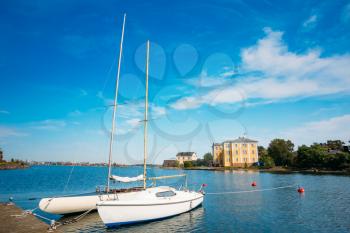 Helsinki, Finland. Harbour And Quay Yacht Stand At Pier, Jetty In Summer Day