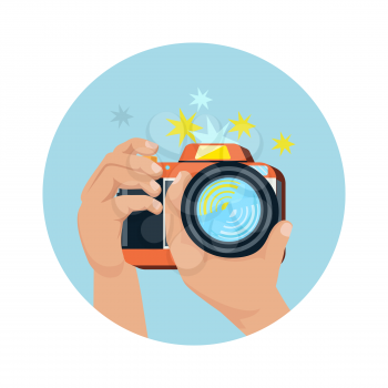 Hands holding camera and photographing in flat design