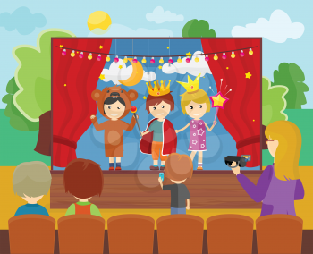 Three children in costumes performing theater play on stage. Little children dressed as a prince, princess and bear. Theatrical performance at kindergarten or school