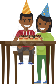 Boy sitting at table with birthday decorated cake with candles and elder girls stands near. Vector illustration of smiling children celebrating Happy Birthday in festive triangular caps on white