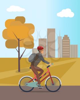 Autumn city park and guy in helmet riding bicycle. Man with backpack on bike, fall leaves and dry grass, skyscrapers at horizon vector illustration.
