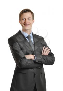 Young successful businessman in a suit and tie. isolated on white