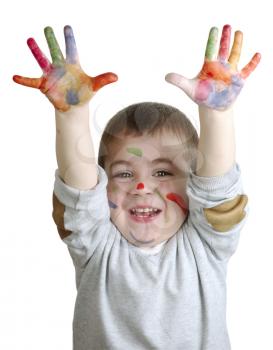  happy little boy with paints on palms isolated on white background