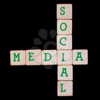 Social media spelled in a crossword on a black background