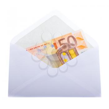 An 50 euro banknote in an envelope on a white background