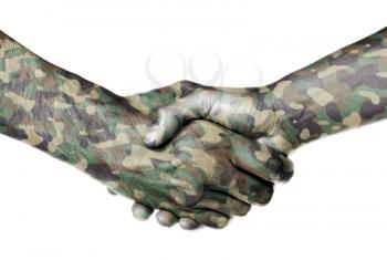 Man and woman shaking hands, camouflaged