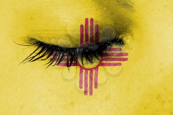 Crying woman, pain and grief concept, flag of New Mexico
