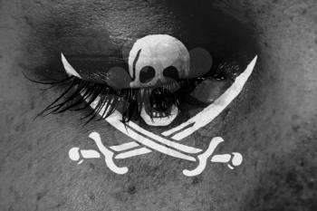 Crying woman, pain and grief concept, pirate flag