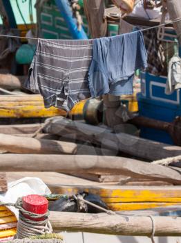 Clothes drying on a washing line in a Vietnamese harbour