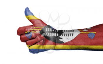 Old woman giving the thumbs up sign, isolated, flag of Swaziland